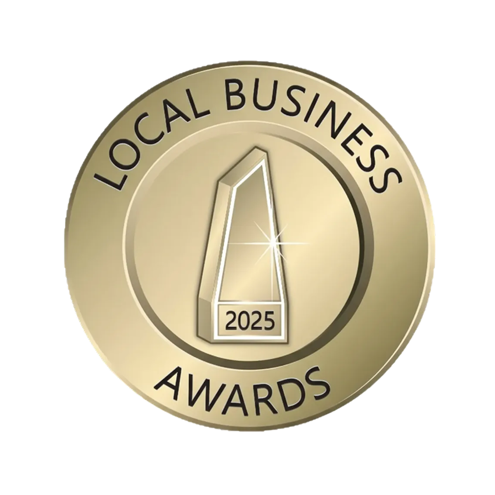 A gold medal-style badge with a geometric trophy design in the center labeled 